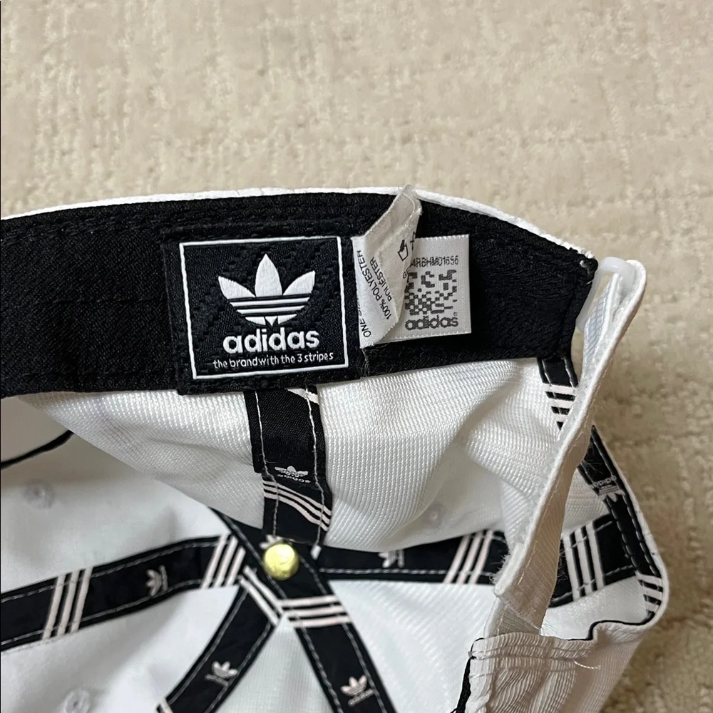 Adidas White Hat with pink Emblem. One size